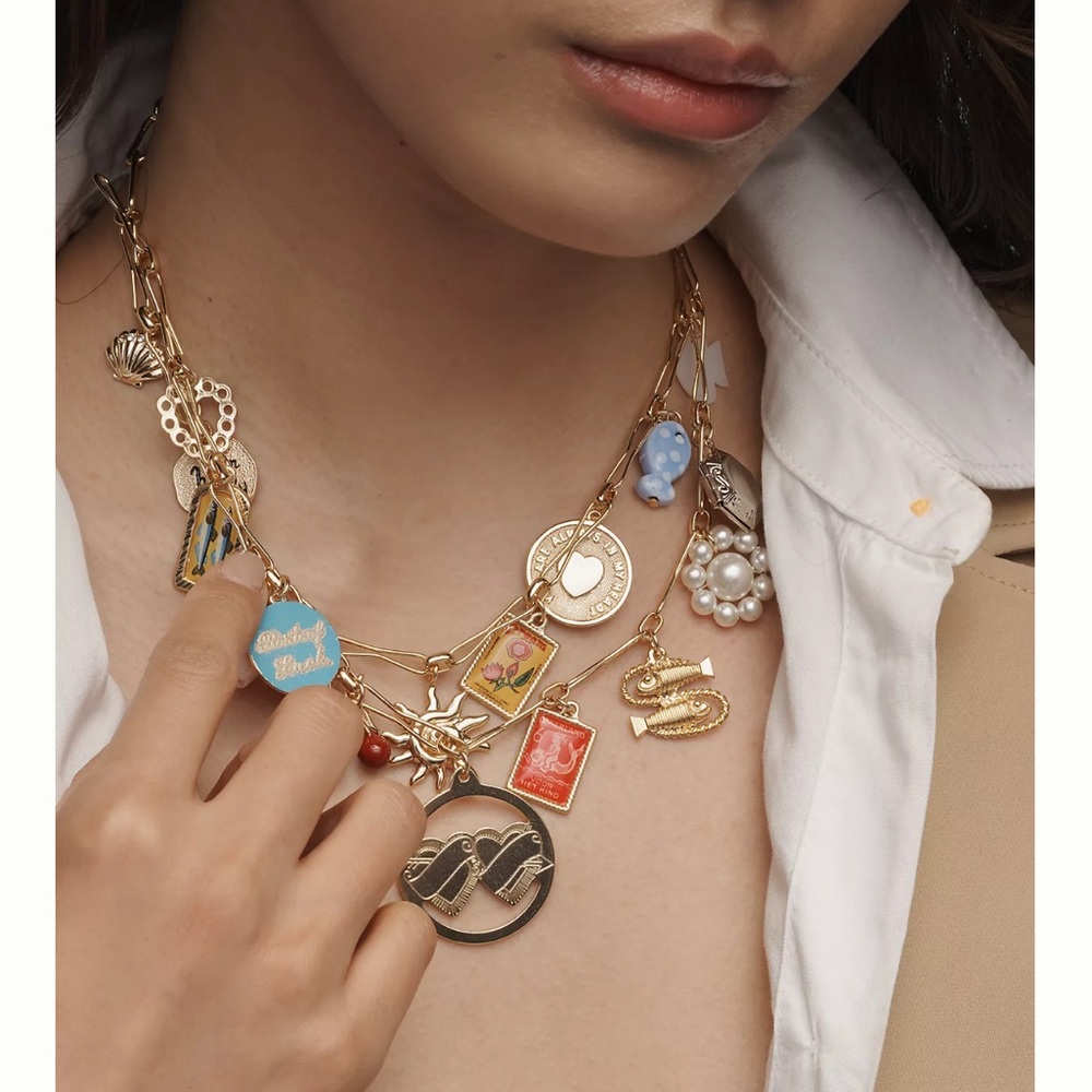 Anthropologie Gold Charm Necklace with Multicolor Charms